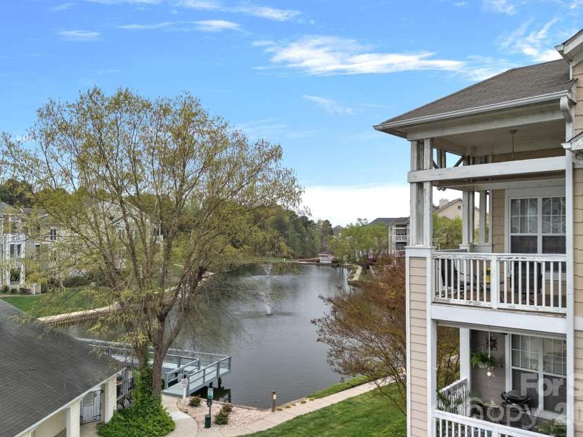 18742 Nautical Drive, Cornelius, NC 28031.  MLS# CAR4343939, YatesRealty ID 4553. Maintained community pond