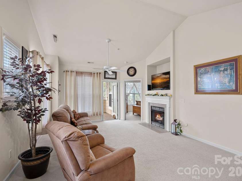 18742 Nautical Drive, Cornelius, NC 28031.  MLS# CAR4343939, YatesRealty ID 4553. Open floor plan with fire place