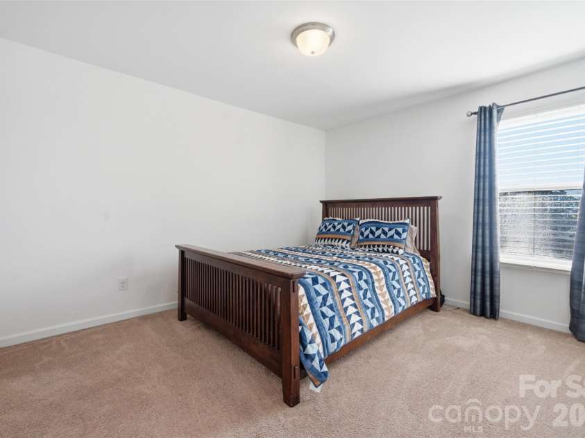 1991 Clear Brook Drive, Kannapolis, NC 28083.  MLS# CAR4416279, YatesRealty ID 45530. Secondary Bedroom 2