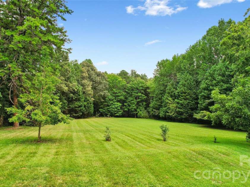 2305 Williams Road, Matthews, NC 28105.  MLS# CAR4416208, YatesRealty ID 45531. Look how pretty this landscaping is!