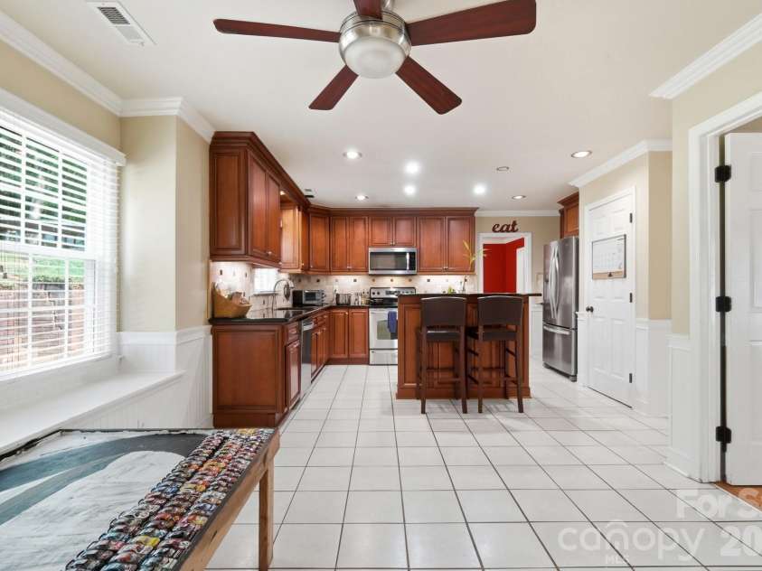 201 Wainsley Place, Matthews, NC 28105.  MLS# CAR4407896, YatesRealty ID 45535. Breakfast Nook, Kitchen