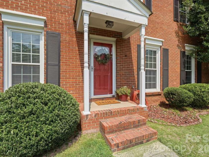 201 Wainsley Place, Matthews, NC 28105.  MLS# CAR4407896, YatesRealty ID 45535. Front Door, Stoop
