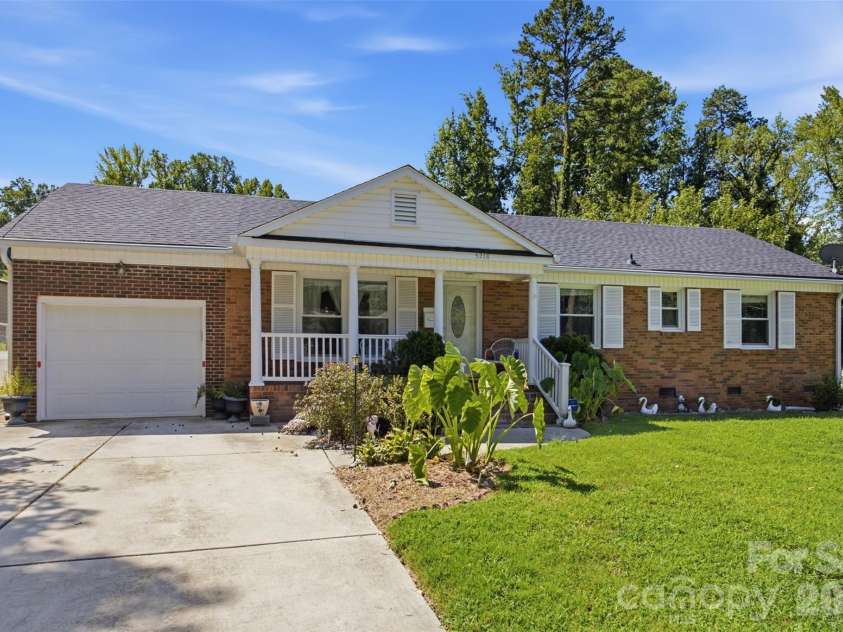 5218 Dolphin Lane, Charlotte, NC 28215.  MLS# CAR4415412, YatesRealty ID 45538. 3 Bedroom ranch on level quarter acre