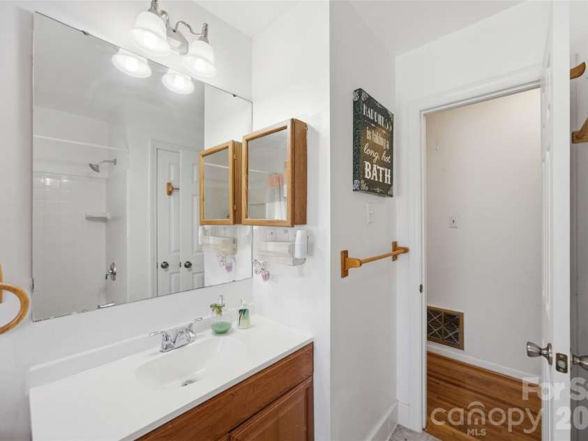 5218 Dolphin Lane, Charlotte, NC 28215.  MLS# CAR4415412, YatesRealty ID 45538. Guest bathroom