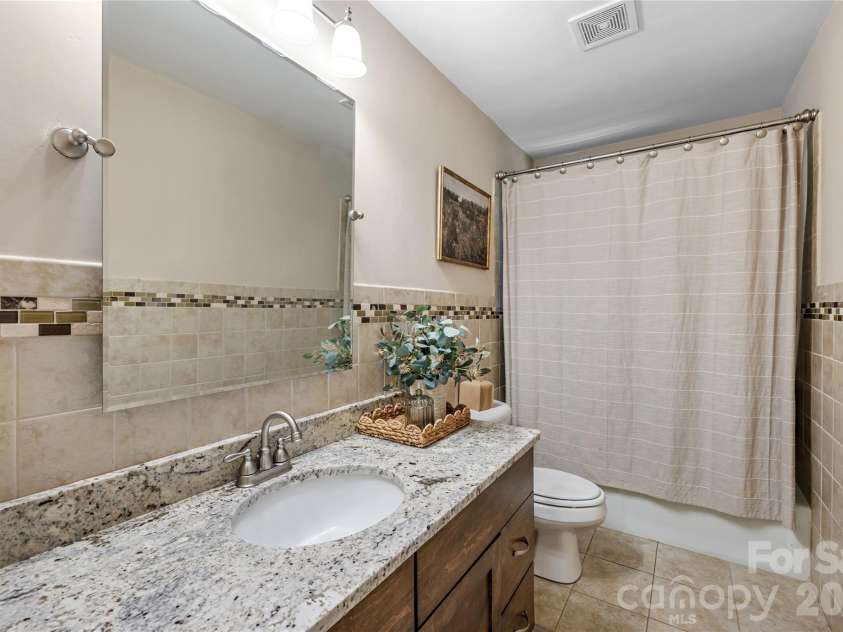 213 Dogwood Drive, Mount Holly, NC 28120.  MLS# CAR4416492, YatesRealty ID 45542. 