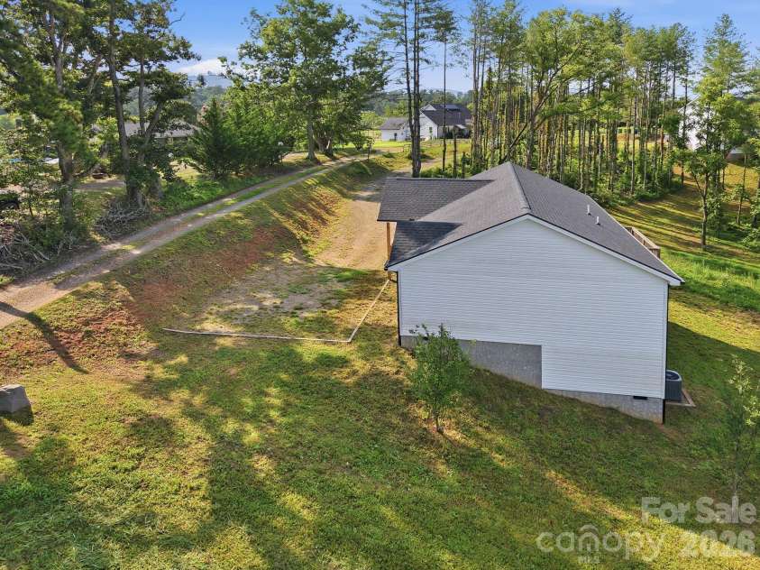 7 Greenridge Road, Weaverville, NC 28787.  MLS# CAR4415328, YatesRealty ID 45550. Surrounded by nature