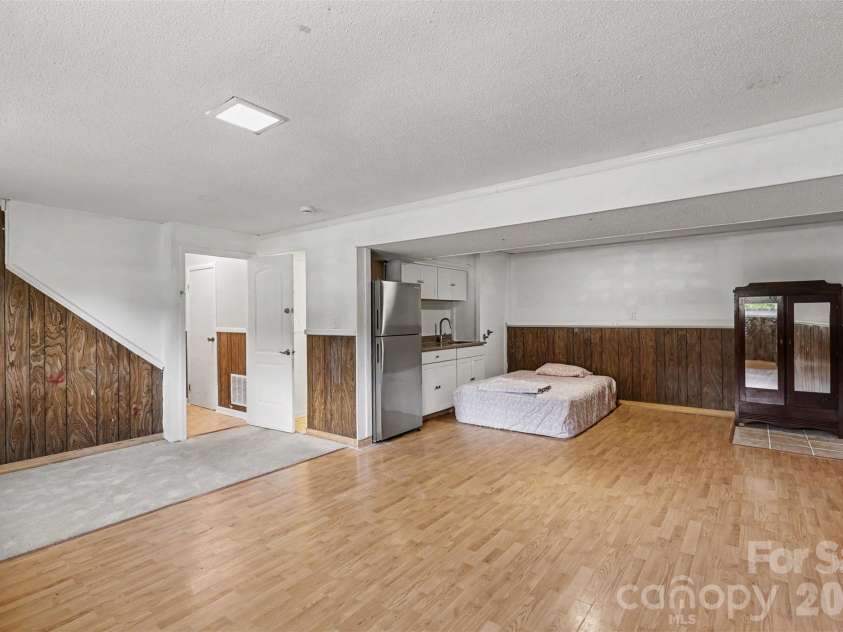 2119 O Hara Drive, Charlotte, NC 28273.  MLS# CAR4415100, YatesRealty ID 45557. Large room with bar/entertaining/kitchenette