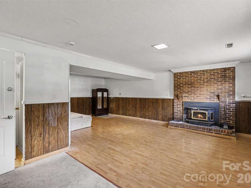2119 O Hara Drive, Charlotte, NC 28273.  MLS# CAR4415100, YatesRealty ID 45557. Rec room in the lower level
