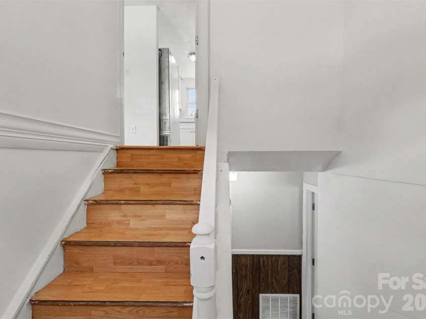 2119 O Hara Drive, Charlotte, NC 28273.  MLS# CAR4415100, YatesRealty ID 45557. Split stairway to main and lower floor