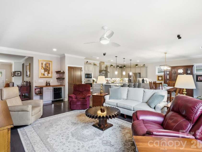 6127 Raven Rock Drive, Denver, NC 28037.  MLS# CAR4414430, YatesRealty ID 45559. A wider view shows just how beautifully the great room flows into the kitchen and dining spaces.