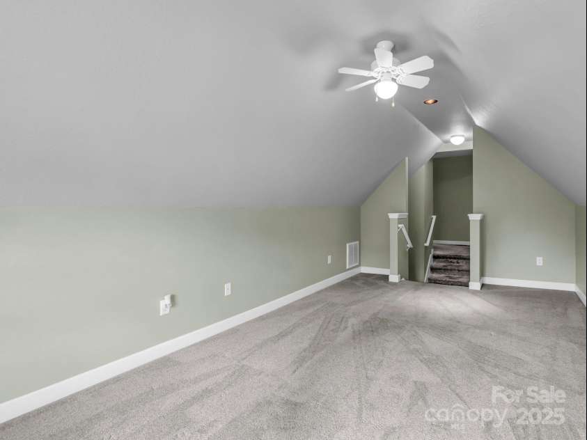 89 Victoria Park Drive, Hendersonville, NC 28792.  MLS# CAR4300693, YatesRealty ID 4556. Virtually staged loft/bonus room