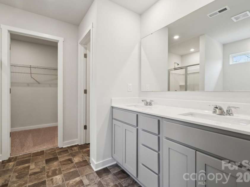 8079 Midas Lane, Locust, NC 28097.  MLS# CAR4387100, YatesRealty ID 45562. Photo is representative