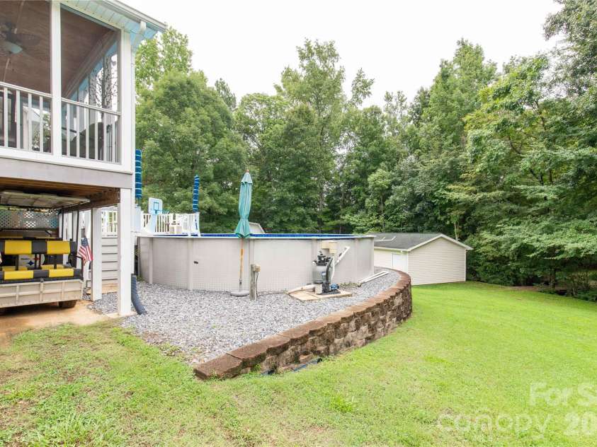901 Clover Park Drive, Clover, SC 29710.  MLS# CAR4416054, YatesRealty ID 45575. Golf cart parking