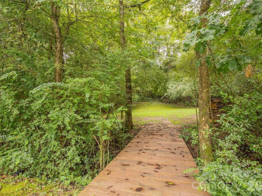 901 Clover Park Drive, Clover, SC 29710.  MLS# CAR4416054, YatesRealty ID 45575. Walkway to rear yard space
