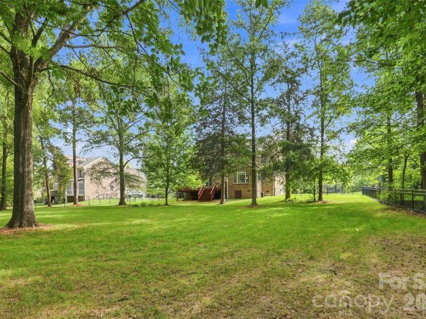 3013 Groves Edge Lane, Waxhaw, NC 28173.  MLS# CAR4403547, YatesRealty ID 45576. Spacious, serene, private backyard