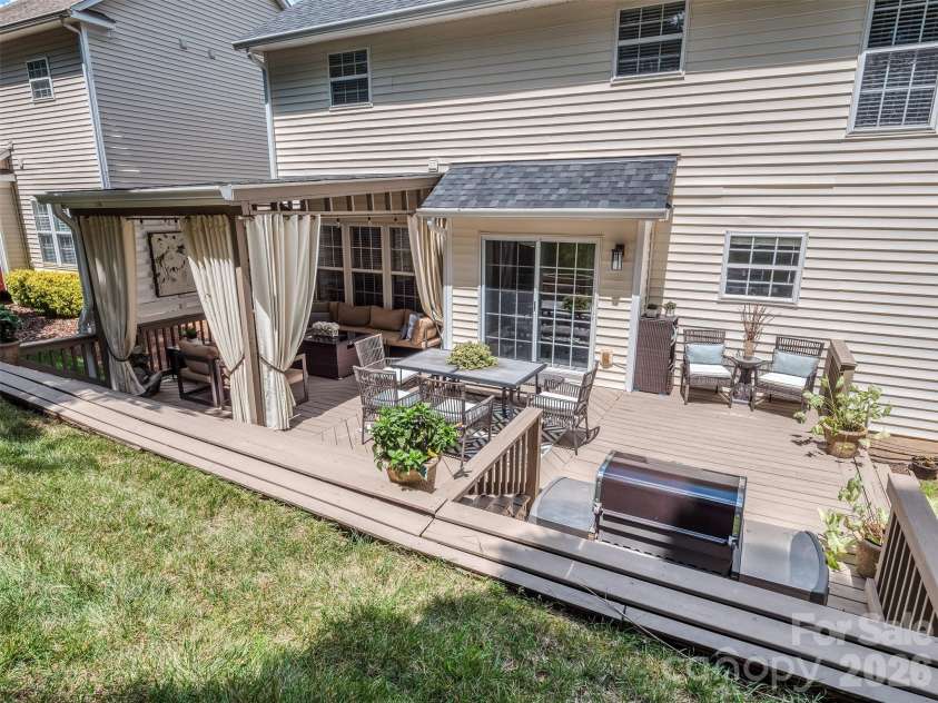 12657 Cardinal Woods Drive, Pineville, NC 28134.  MLS# CAR4411297, YatesRealty ID 45585. Back yard