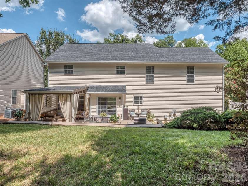 12657 Cardinal Woods Drive, Pineville, NC 28134.  MLS# CAR4411297, YatesRealty ID 45585. Back yard