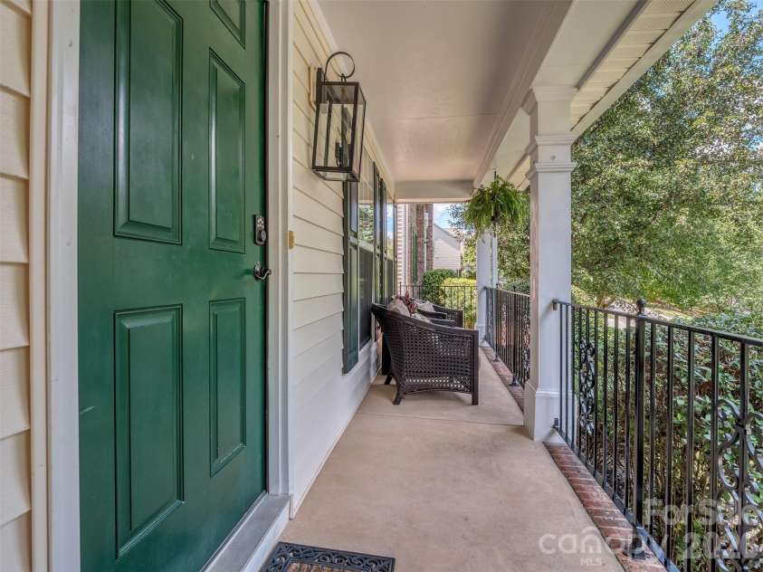 12657 Cardinal Woods Drive, Pineville, NC 28134.  MLS# CAR4411297, YatesRealty ID 45585. Covered front porch