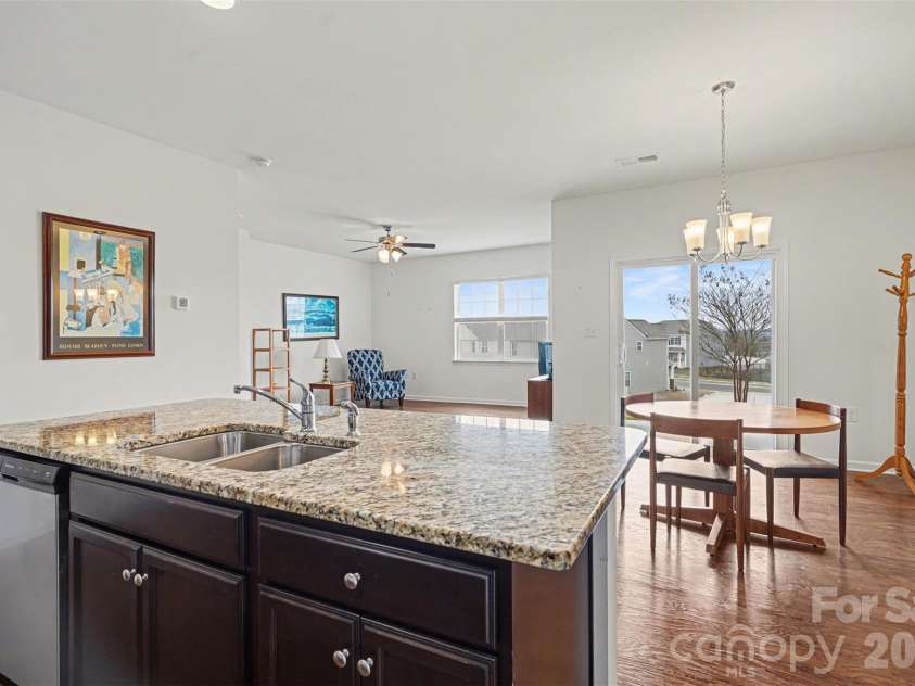 1212 Kent Downs Avenue, Concord, NC 28027.  MLS# CAR4352832, YatesRealty ID 4559. Kitchen looking onto the dining area