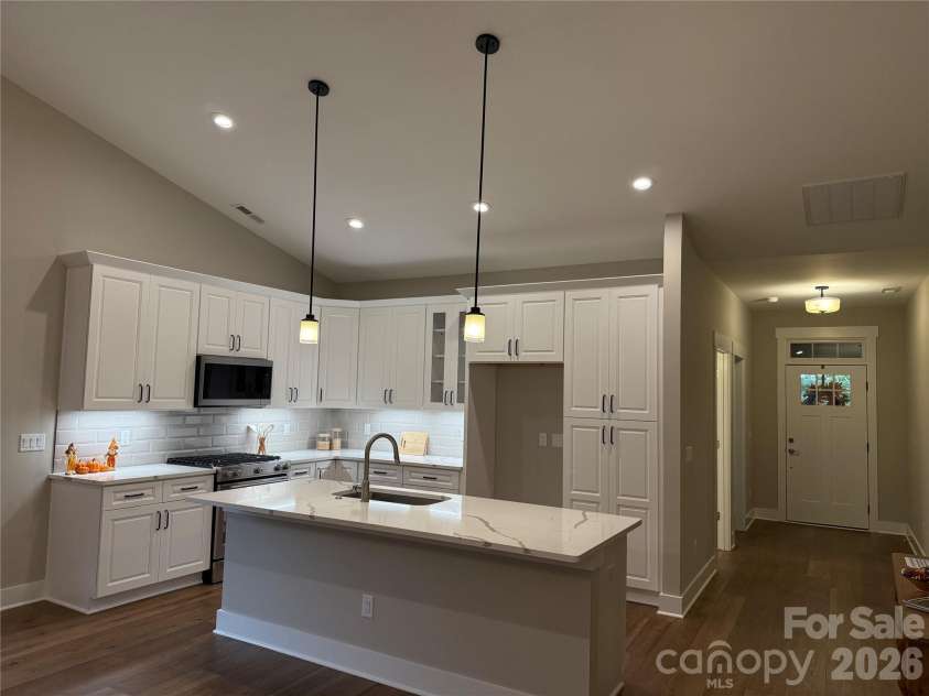 16 Craftsman Overlook Ridge, Arden, NC 28704.  MLS# CAR4383199, YatesRealty ID 45591. Kitchen and Front Door