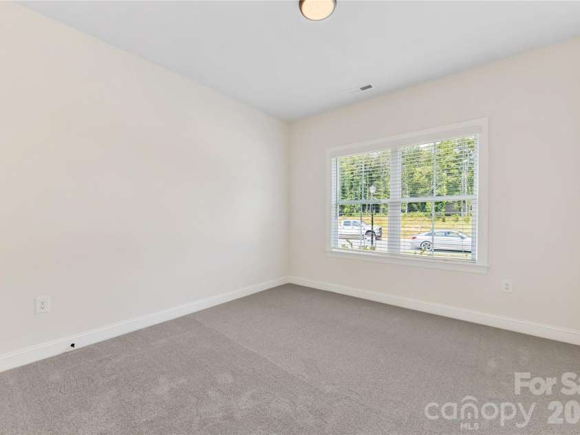 1270 Archer Loop, Waxhaw, NC 28173.  MLS# CAR4388287, YatesRealty ID 45596. Front Bedroom downstairs