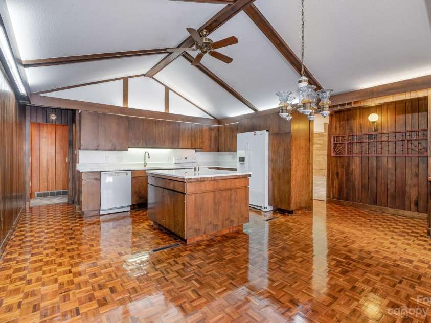 2756 Peachtree Road, Statesville, NC 28625.  MLS# CAR4072282, YatesRealty ID 456. View shows kitchen entering from hallway.