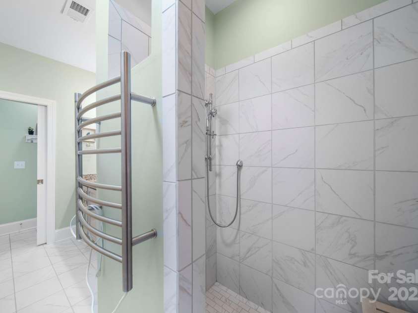 5256 Courtyard Lane, Belmont, NC 28012.  MLS# CAR4299282, YatesRealty ID 4561. Walk in shower, heated towel rack
