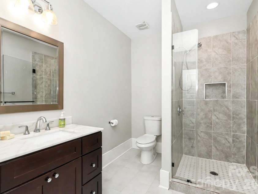 720 17th Street, Charlotte, NC 28205.  MLS# CAR4412206, YatesRealty ID 45620. 5th full bathroom on lower level