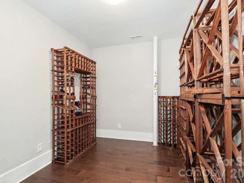720 17th Street, Charlotte, NC 28205.  MLS# CAR4412206, YatesRealty ID 45620. Wine room lower level