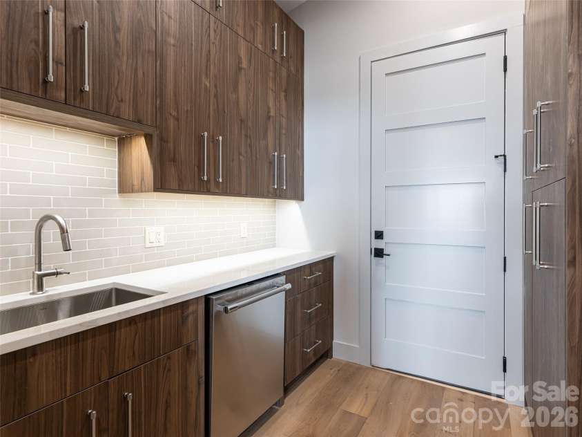 247 Coachman Drive, Hendersonville, NC 28791.  MLS# CAR4355348, YatesRealty ID 45621. Back Kitchen with 2nd Sink and 2nd Dishwasher