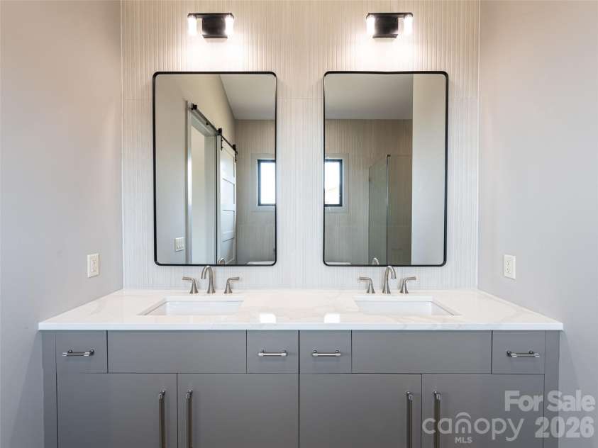 247 Coachman Drive, Hendersonville, NC 28791.  MLS# CAR4355348, YatesRealty ID 45621. Double Vanity Sinks in Primary Bathroom