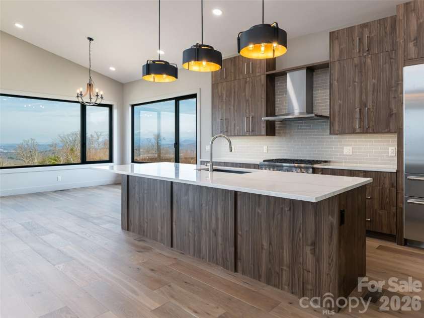 247 Coachman Drive, Hendersonville, NC 28791.  MLS# CAR4355348, YatesRealty ID 45621. Kitchen / Kitchen Island / Dining Room