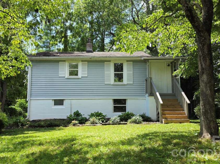 827 Forest Street, Hendersonville, NC 28739.  MLS# CAR4416484, YatesRealty ID 45624. Front elevation 827 Forest St