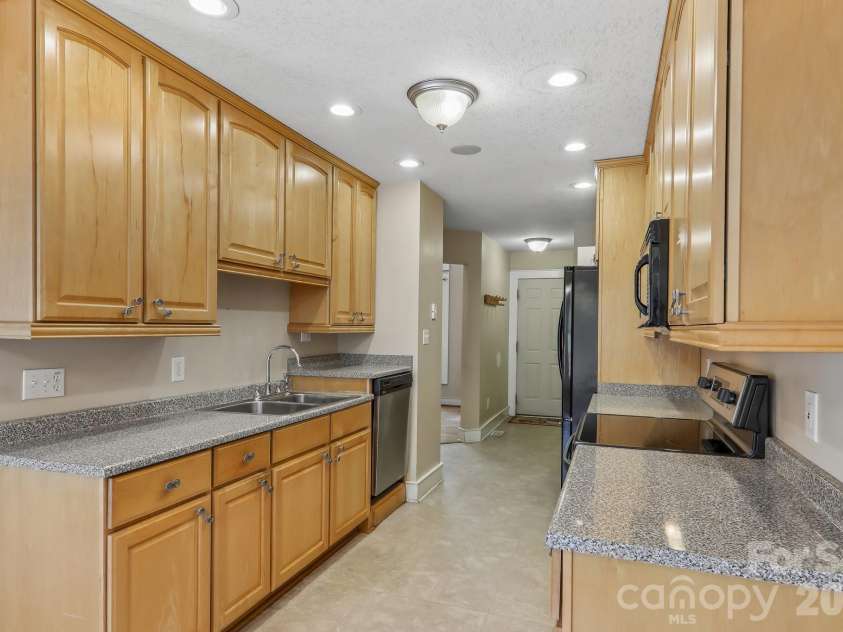 1414 Kanuga Road, Hendersonville, NC 28739.  MLS# CAR4415516, YatesRealty ID 45627. Kitchen Main Level