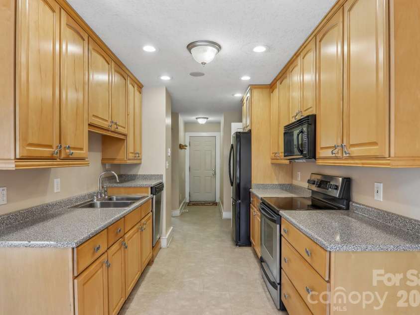 1414 Kanuga Road, Hendersonville, NC 28739.  MLS# CAR4415516, YatesRealty ID 45627. Kitchen Main Level