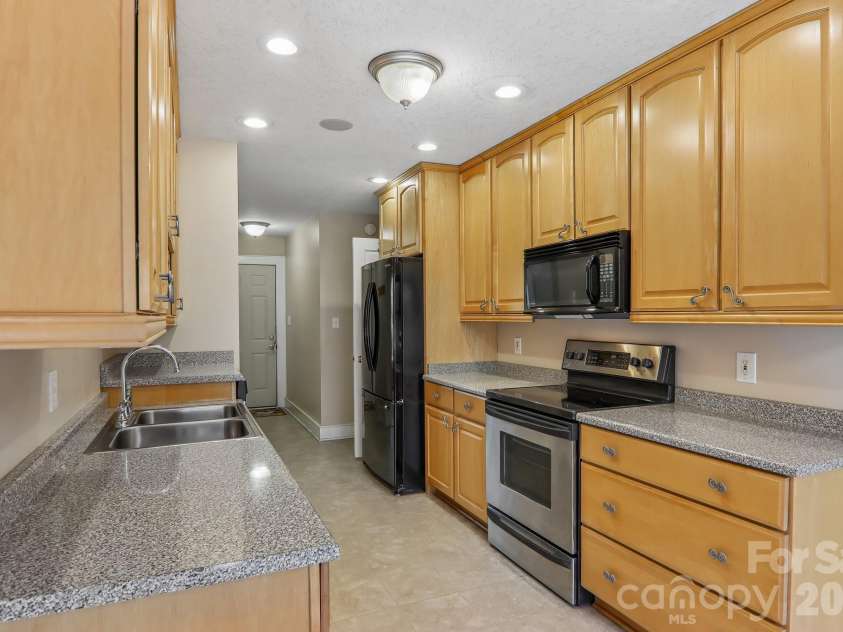 1414 Kanuga Road, Hendersonville, NC 28739.  MLS# CAR4415516, YatesRealty ID 45627. Kitchen Main Level