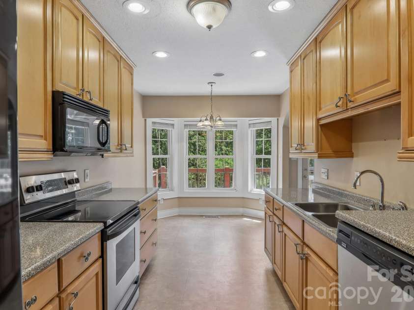 1414 Kanuga Road, Hendersonville, NC 28739.  MLS# CAR4415516, YatesRealty ID 45627. Kitchen Main Level