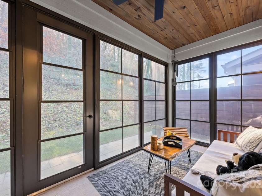 513 Sweet Birch Park Lane, Black Mountain, NC 28711.  MLS# CAR4322583, YatesRealty ID 4563. Year round ez breeze screened porch