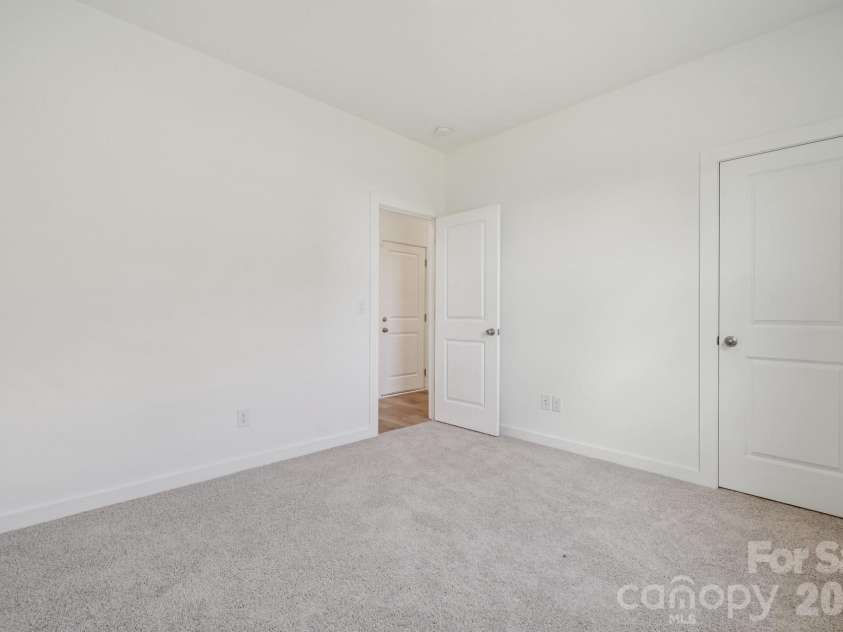 404 Rudisil Drive, Locust, NC 28097.  MLS# CAR4387106, YatesRealty ID 45634. Photo is representative