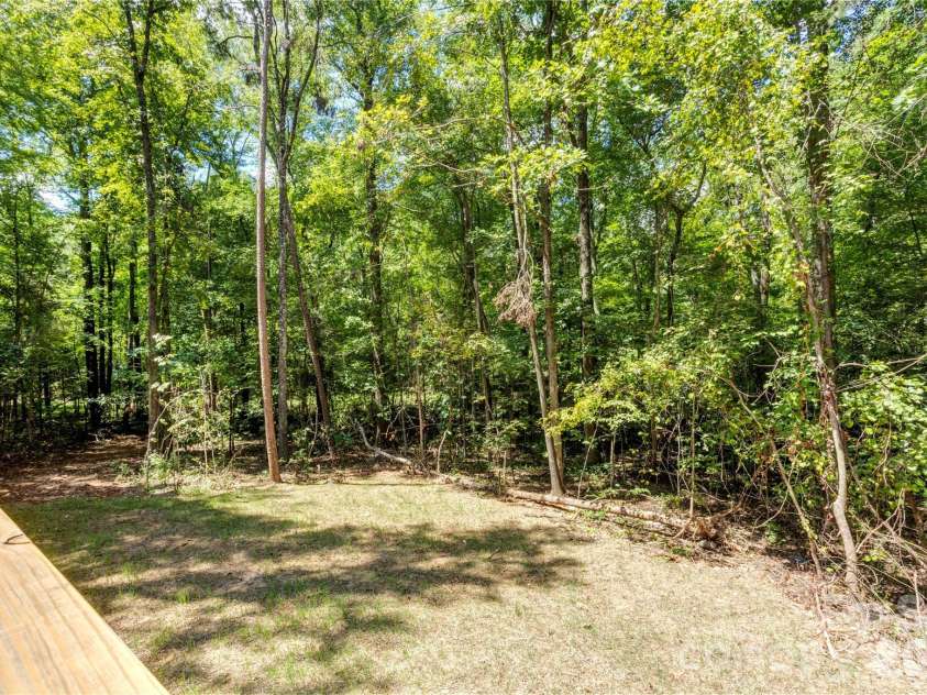 496 Fisk Street, Concord, NC 28027.  MLS# CAR4416068, YatesRealty ID 45635. Back yard