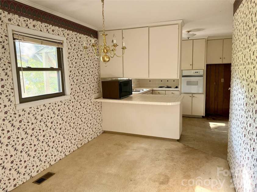 2207 Billy Street, Kannapolis, NC 28083.  MLS# CAR4407887, YatesRealty ID 45638. Dining Room & Kitchen.
