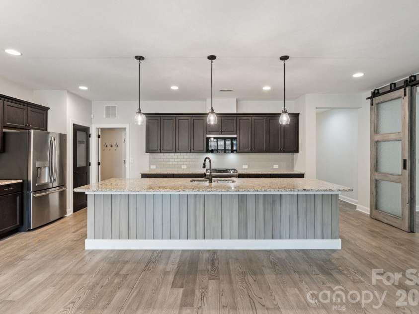 4995 Looking Glass Trail, Denver, NC 28037.  MLS# CAR4333286, YatesRealty ID 4564. Open concept kitchen with large island