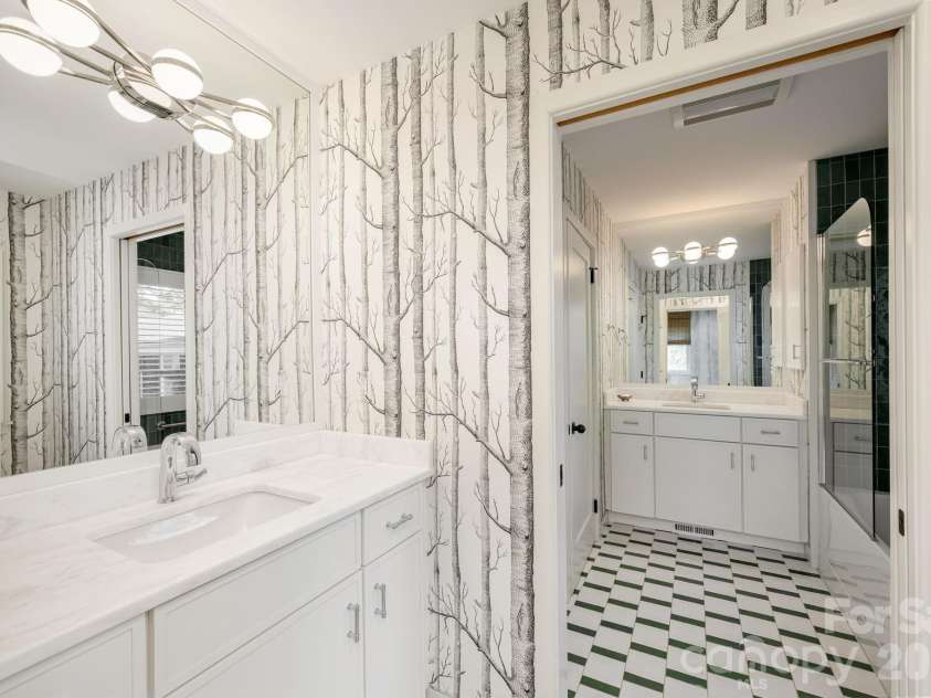 28 Forest Road, Asheville, NC 28803.  MLS# CAR4361641, YatesRealty ID 45647. Like a Jack and Jill bath