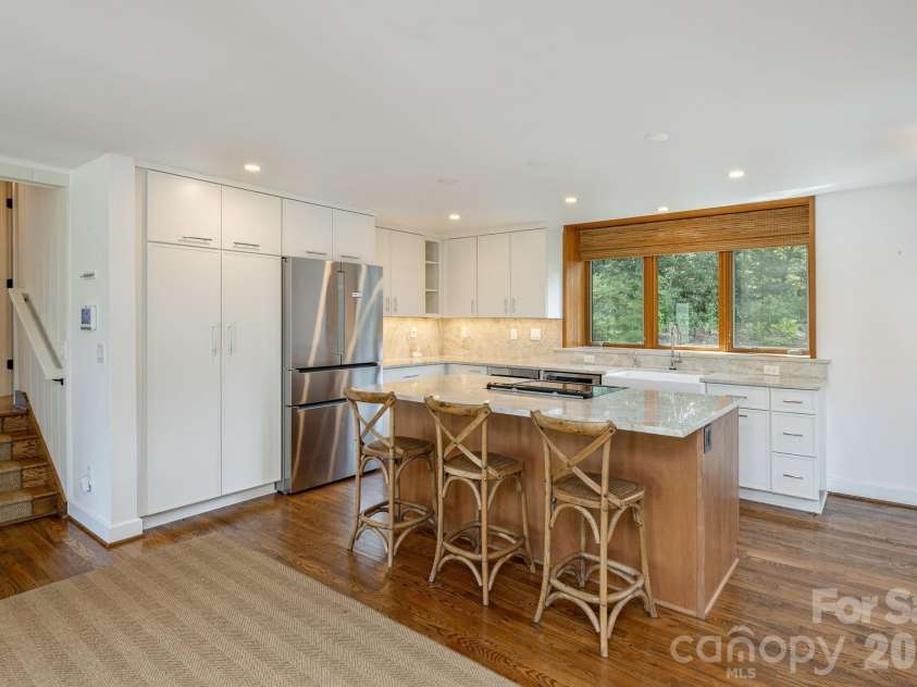 28 Forest Road, Asheville, NC 28803.  MLS# CAR4361641, YatesRealty ID 45647. Open kitchen with island