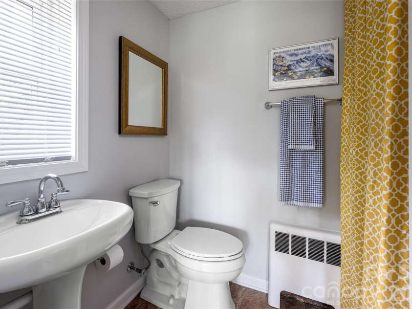 114 Cambridge Road, Asheville, NC 28804.  MLS# CAR4415783, YatesRealty ID 45672. Lower level bath