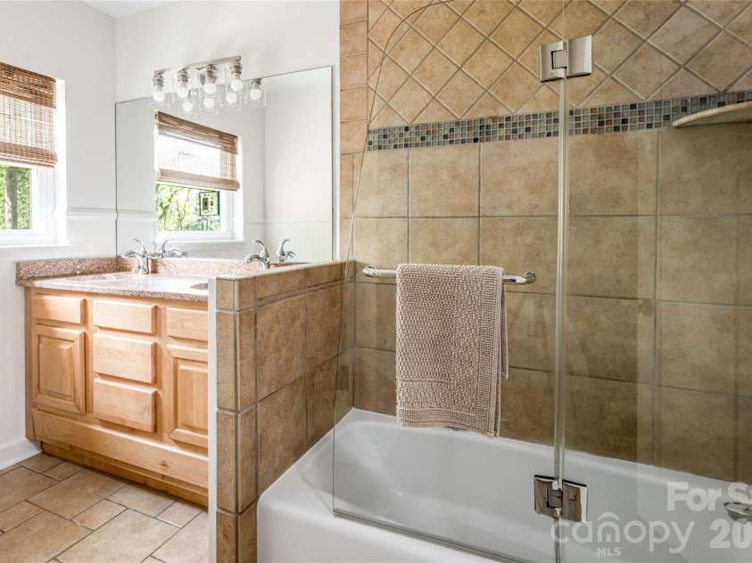 114 Cambridge Road, Asheville, NC 28804.  MLS# CAR4415783, YatesRealty ID 45672. Upper bathroom