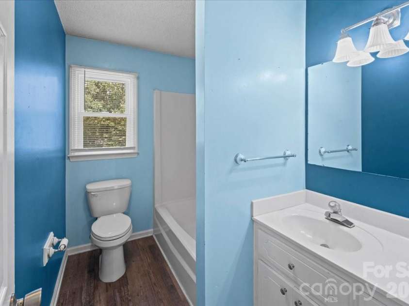 517 Elm Street, Locust, NC 28097.  MLS# CAR4416638, YatesRealty ID 45693. Primary bath
