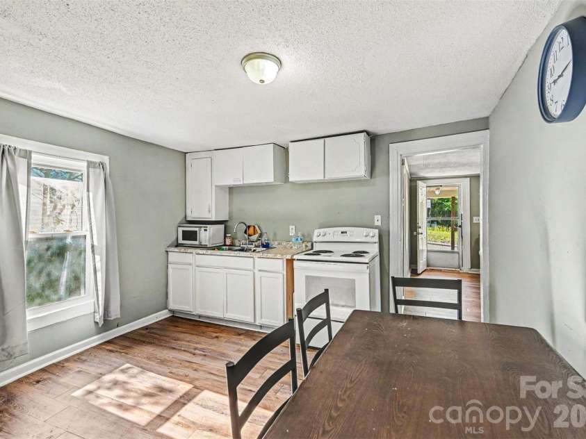 1025 Martin Luther King Jr Drive, Albemarle, NC 28001.  MLS# CAR4380740, YatesRealty ID 457. Kitchen and dining area