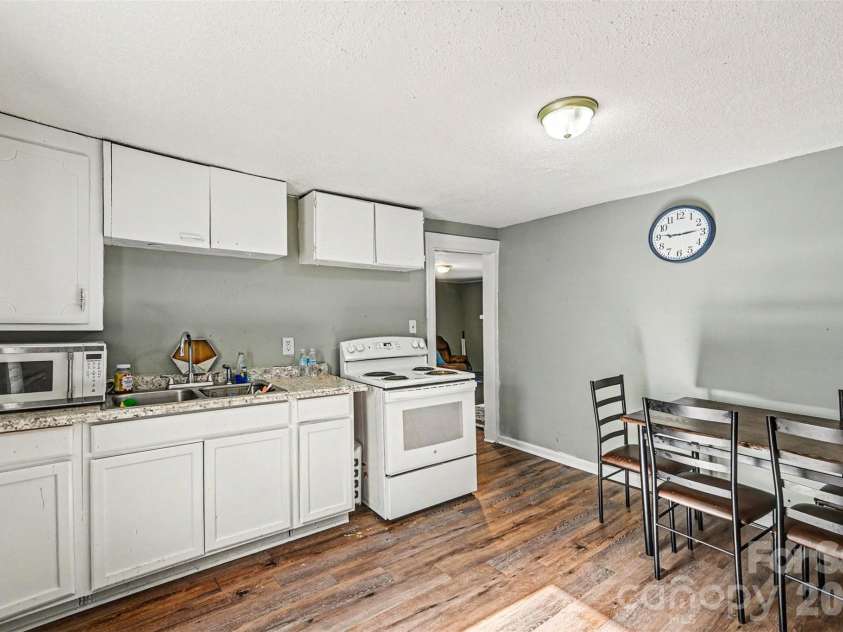 1025 Martin Luther King Jr Drive, Albemarle, NC 28001.  MLS# CAR4380740, YatesRealty ID 457. Kitchen and dining area