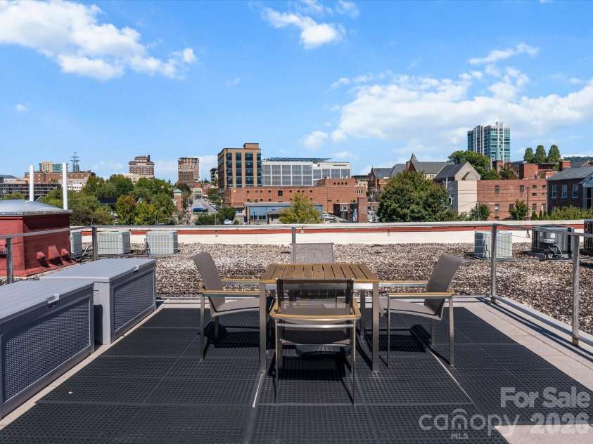 100 Coxe Avenue, Asheville, NC 28801.  MLS# CAR4307768, YatesRealty ID 4570. Dine with a view